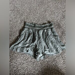Green and white patterned shorts
